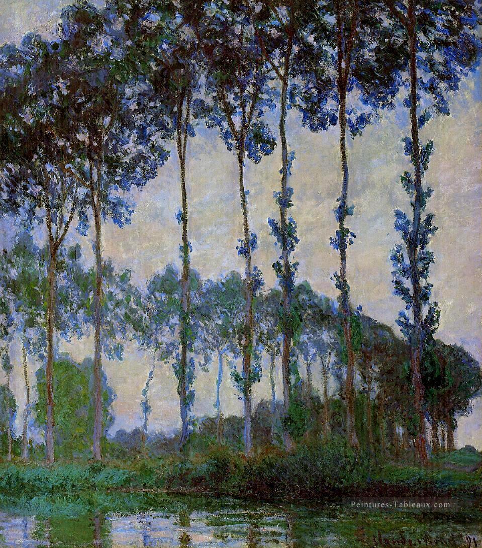 Peupliers sur les bords de la rivière Epte au crépuscule Claude Monet Peintures à l'huile